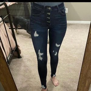 Button fly, skinny, distressed, dark denim